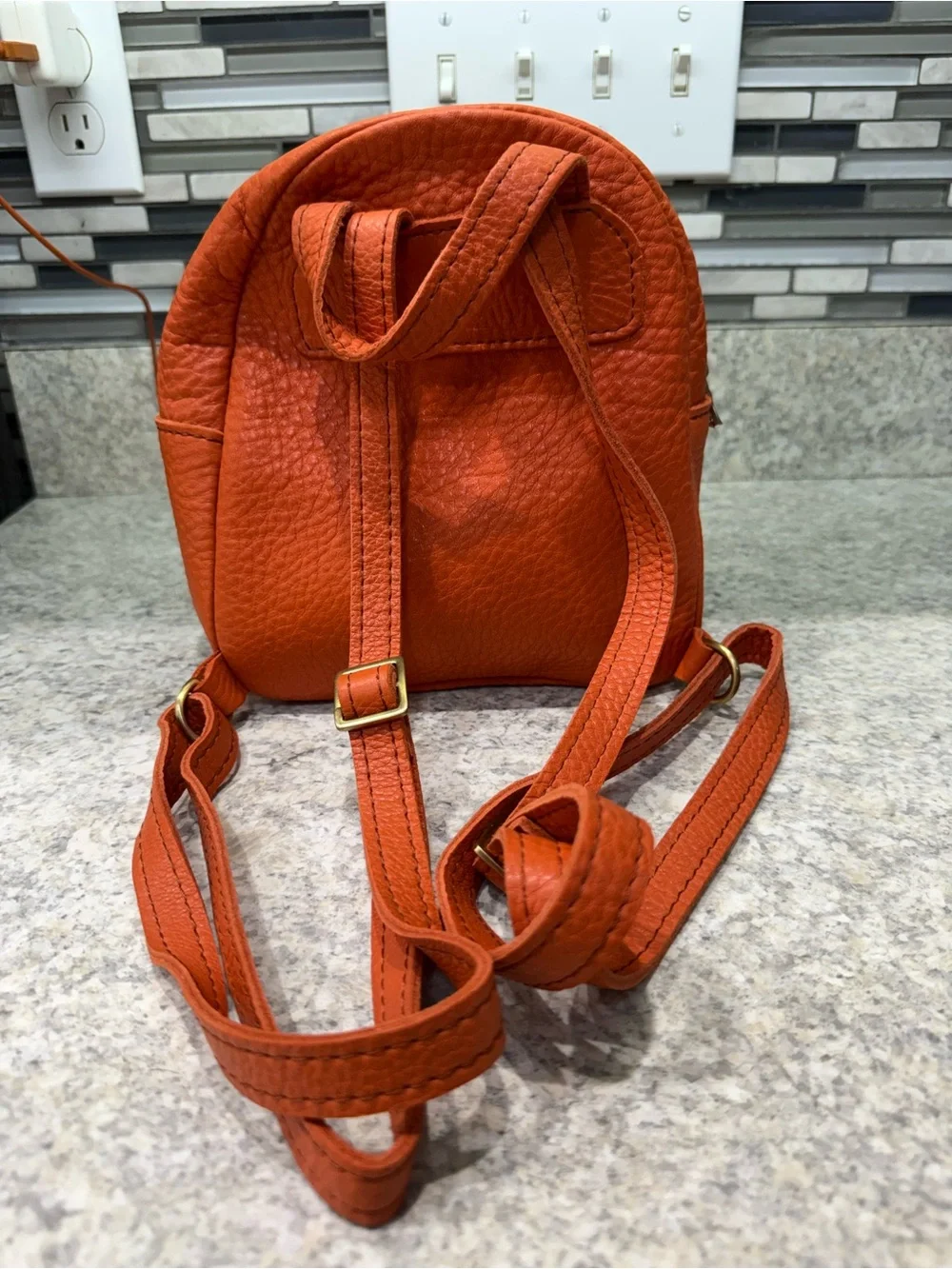 Portland Leather Orange Pebbled Leather Mini Backpack